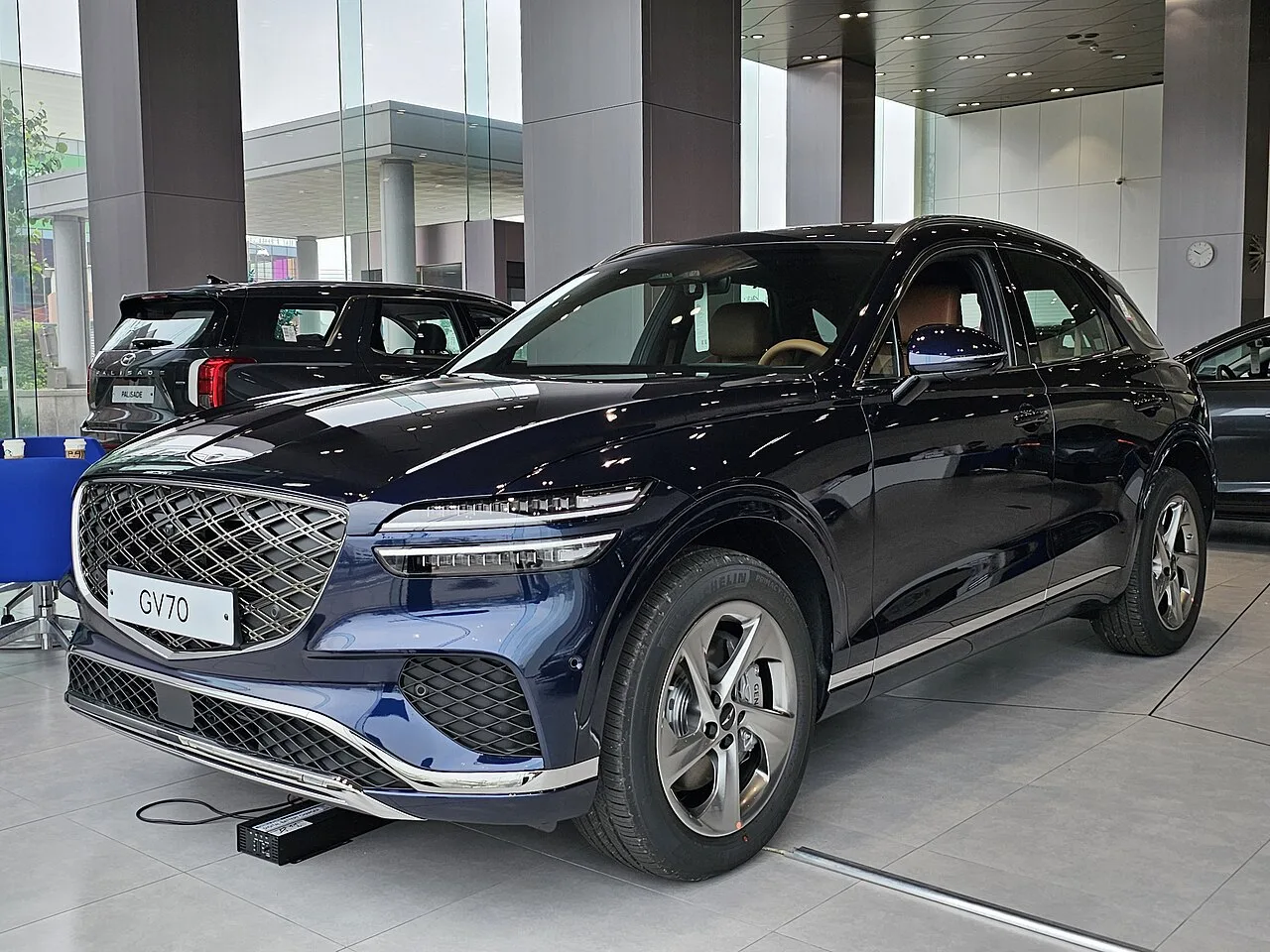 Genesis GV70 — fotografía real de la unidad de referencia, vista 1